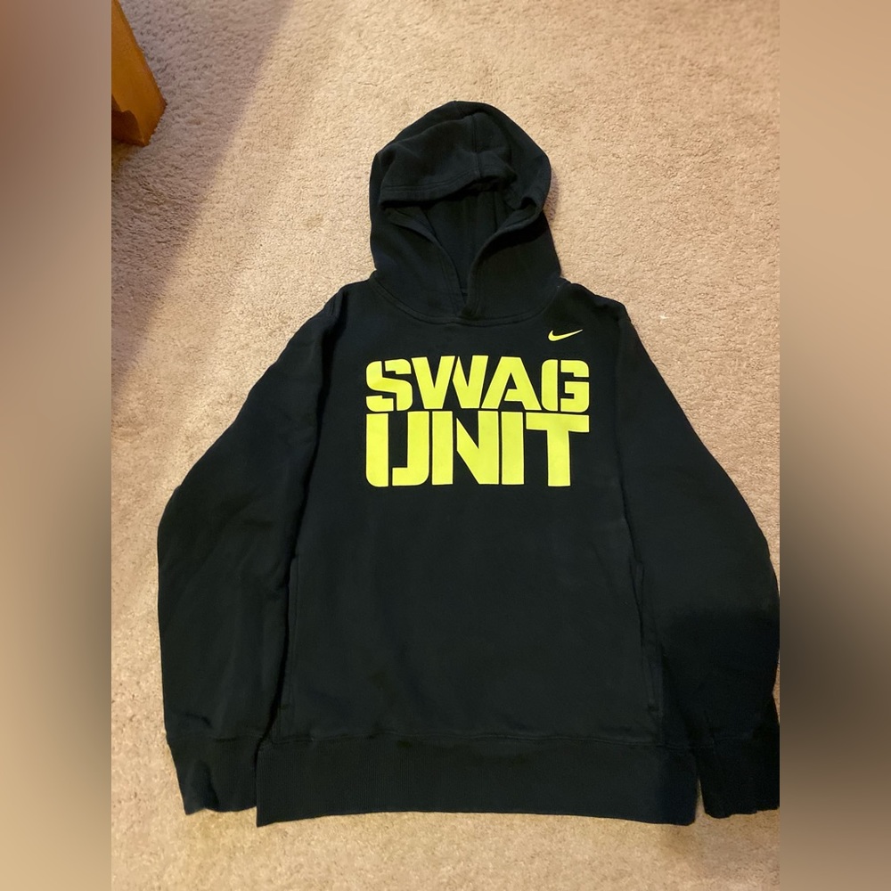 Two Nike hoodies.
